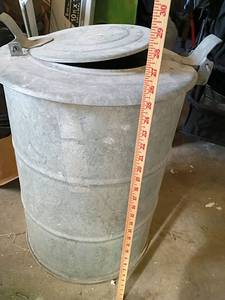 lot 84 image: Large Galvanized Steel heater Can with LidHeavy antique old heater