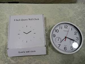 lot 95 image: Vigorwise 8-Inch Wall Clock with Temperature and Humidity Gauge