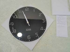 lot 102 image: Modern XNM Black Wall Clock