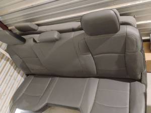 lot 100 image: 2025 Dodge Pickup Bench Seats.  One is leather the other is upholstered