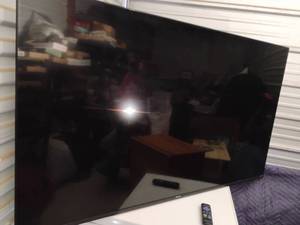 lot 102 image: Hisense Roku 60 inch Television with Remote