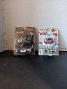 lot 137 image: Dale Jr #88 Collectable (never opened)