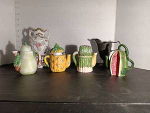 lot 154 image: Vase w miniature tea pots &more