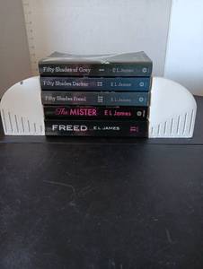 lot 213 image: E L James Book Collection and Book holder