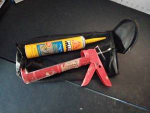 lot 294 image: Caulking gun wconcrete fix tub