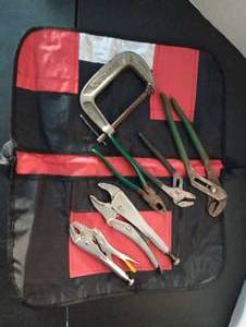 lot 295 image: Snap on vice grip and different tools wover the chair holder