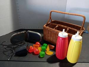 lot 305 image: Radioshack Chargeable Speaker and picnic item wbasket
