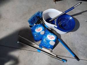 lot 373 image: Spin mop, ceiling fan and curtain rods