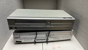 lot 884 image: 2 DVD & VCR Combos - Both Power On Have Not Tested Any Further