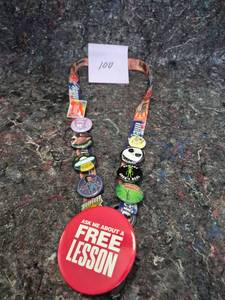 lot 0 image: FLAIR - Guitar Center Employee Badge with Pop Culture Pins