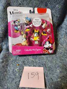 lot 59 image: Disney Minnie Mouse Through the Years Mini Figure Set