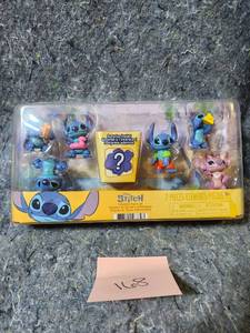 lot 68 image: Disney Stitch 7-Piece Collectible Figure Set