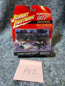lot 82 image: Johnny Lightning James Bond 007 Goldfinger Die-Cast Cars Set - Some Box Damage