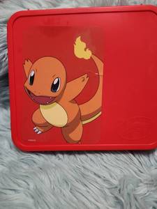 lot 109 image: Pokemon Art Set with Charmander Case Good Pre-owned Condition.  Very Few Pieces Used - Missing a Marker or Two