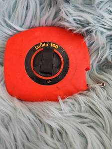 lot 205 image: Lufkin 100 Orange Measuring Tape