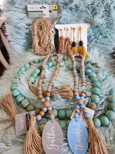 lot 216 image: True Living Macrame Plant Hanger and Garland Beads Set