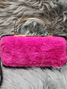 lot 294 image: Pink Faux Fur Frame Clutch Wallet
