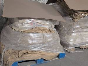 lot 1009 image: Bulk Used Burlap and Plastic Wrap Bundle