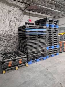 lot 1024 image: Industrial Plastic Pallets - Stackable Storage Solutions- one stack per lot first come first serve