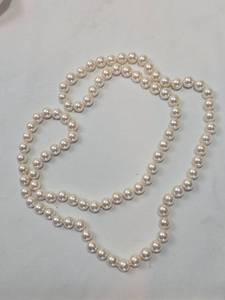 lot 11 image: Long Pearl Beaded Necklace