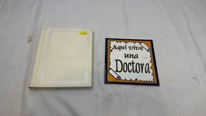 lot 66 image: Spanish Doctor Ceramic Tile with Photo Album