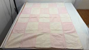 lot 69 image: Handstitched Pink and White Baby Quilt with Animal Designs