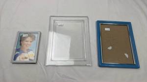 lot 147 image: 1980s Clear and Blue Picture Frame Set