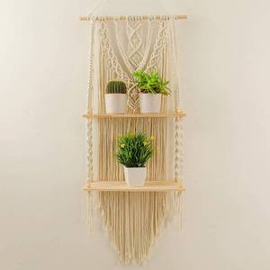 lot 119 image: Mong Macrame Wall Hanging Shelf - Boho Hanging Shelves for Wall - Decorative Bohemian Floating Plants Room Storage Shelving Macrame Rope Decor Organizer Rack, 2 Tier Handmade Plant Shelves - Retail $27