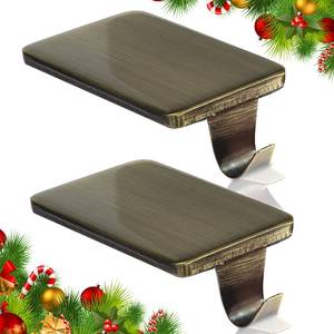 lot 249 image: HMASYO Christmas Stocking Holders for Mantle Set of 2, Heavy Duty Cast Iron Stocking Hangers Base, Low Profile Weighted Stocking Holder Hooks for Fireplace Tabletop Shelf Christmas Decoration, Bronze - Retail $16