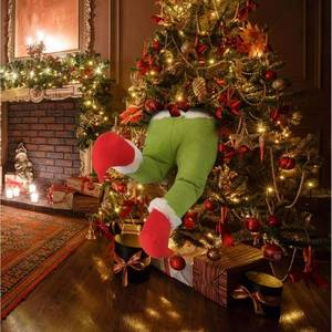 lot 253 image: Christmas Tree Topper Decoration, Green Elf Legs Ornament, Non-Electric Festive Plush Stuffed Holiday Decor for Christmas and Halloween - Retail $10