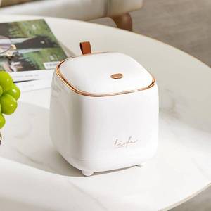 lot 54783 image: Mini Desk bin with Lid, Small Plastic Trash can for Kitchen Bathroom Office Countertop, Button Desktop Waste Bin, Waterproof Rubbish Bin with 50 Trash Bags - Retail $15