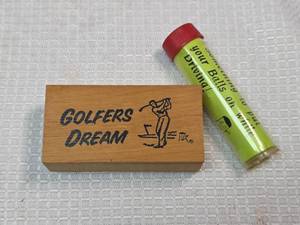 lot 36 image: Golfers Dream Wooden Golf Tee Display Box and gag gift tee