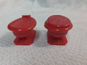 lot 37 image: Red Plastic Toilet Salt and Pepper Shakers