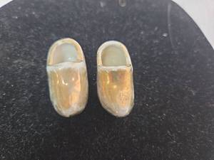 lot 41 image: Mini Porcelain clogs with Gold Accents