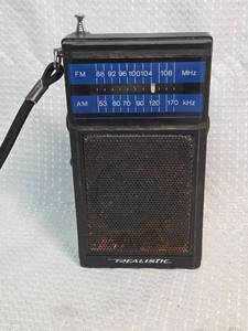 lot 60 image: Realistic Model 12-724 AMFM Portable Radio