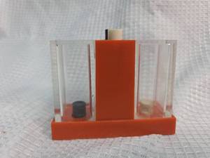 lot 151 image: Vintage 60s Whirley Industries push button plastic salt and pepper shaker