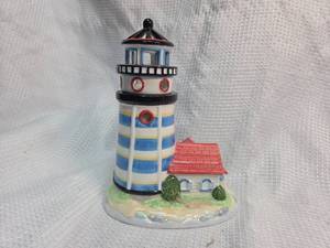lot 161 image: AVON Decorative Lighthouse Figurine with House