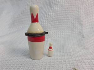 lot 163 image: German Red and White Bowling Pin Needle Case
