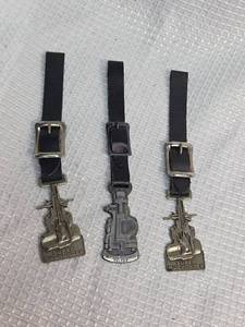 lot 174 image: Rockwell Manufacturing Super Mudwonder Watch Fobs