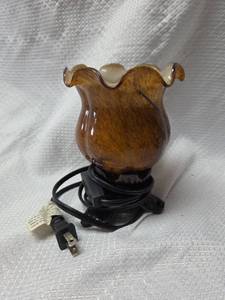 lot 192 image: Amber Glass Electric Hurricane Lamp