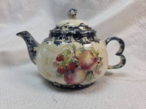 lot 331 image: Miniature Blue and White Fruit Decorated Teapot