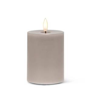 lot 14 image: Abbott Collection Wax LED Flameless Pillar Candle - Gray (3x4 H) - Retail $20