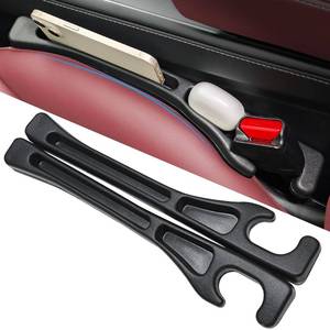 lot 86 image: Car Seat Gap Filler Organizer, 2 Pack Seat Gap Plug with Storage Slot, No Drop Seat Guard for Cars & SUVs, Car Seat Accessories with Phone Holder, Universal Fit Fill The Gap Between Seat and Console - Retail $9