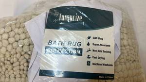 lot 68205 image: Turquoise Non-Slip Chenille Bath Mat 59x20 Color is Ivory - Retail $25