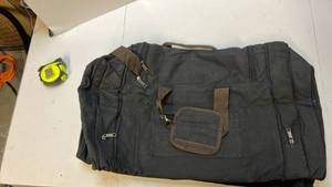 lot 68370 image: Black Canvas Multi-Pocket Duffel Bag - Retail $25