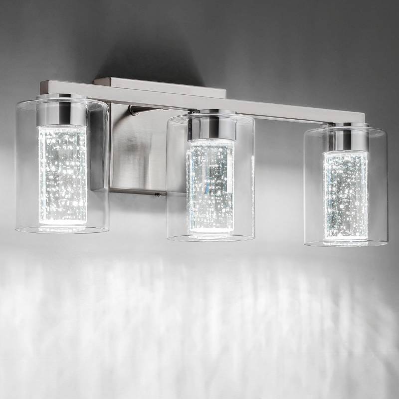 lot 34469 image: 3-Light Brushed Nickel Vanity Light with 3 Color Modes (3000K4000K6000K), Eye Protection LED Bathroom Light Fixture, Dimmable Modern Wall Light Over Mirror with Clear Glass Shade - Retail $70