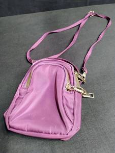 lot 1642 image: Pink Multi-Zipper Crossbody Bag