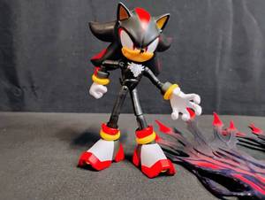 lot 1700 image: Shadow the Hedgehog Action Figure with Energy Effect Damaged