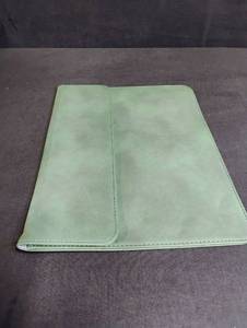 lot 1734 image: Mint Green Leather Tablet Case