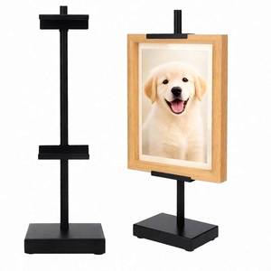 lot 51693 image: FLHNXX Adjustable Tabletop Easel Stand, Picture Easels for Display Up to 29 H, Metal Picture Frame Holder Stand Table for Art, Photo (black) - Retail $27